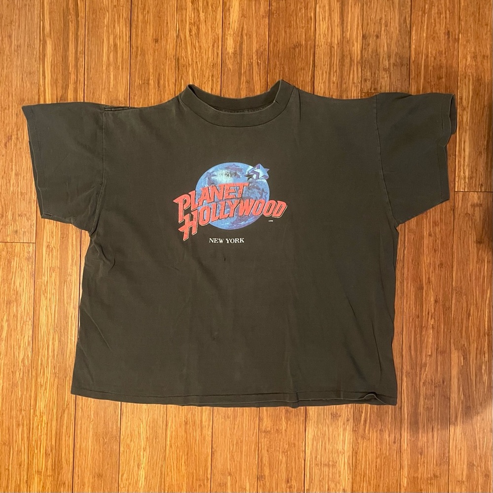 Vintage 90’s NYC Planet Hollywood distressed faded black t-shirt, size XL.